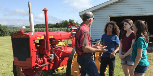 Farmer talking to Gen Z students